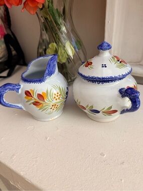 Vintage Henriot Quimper Fleuri Royal creamer pitcher and sugar bowl.